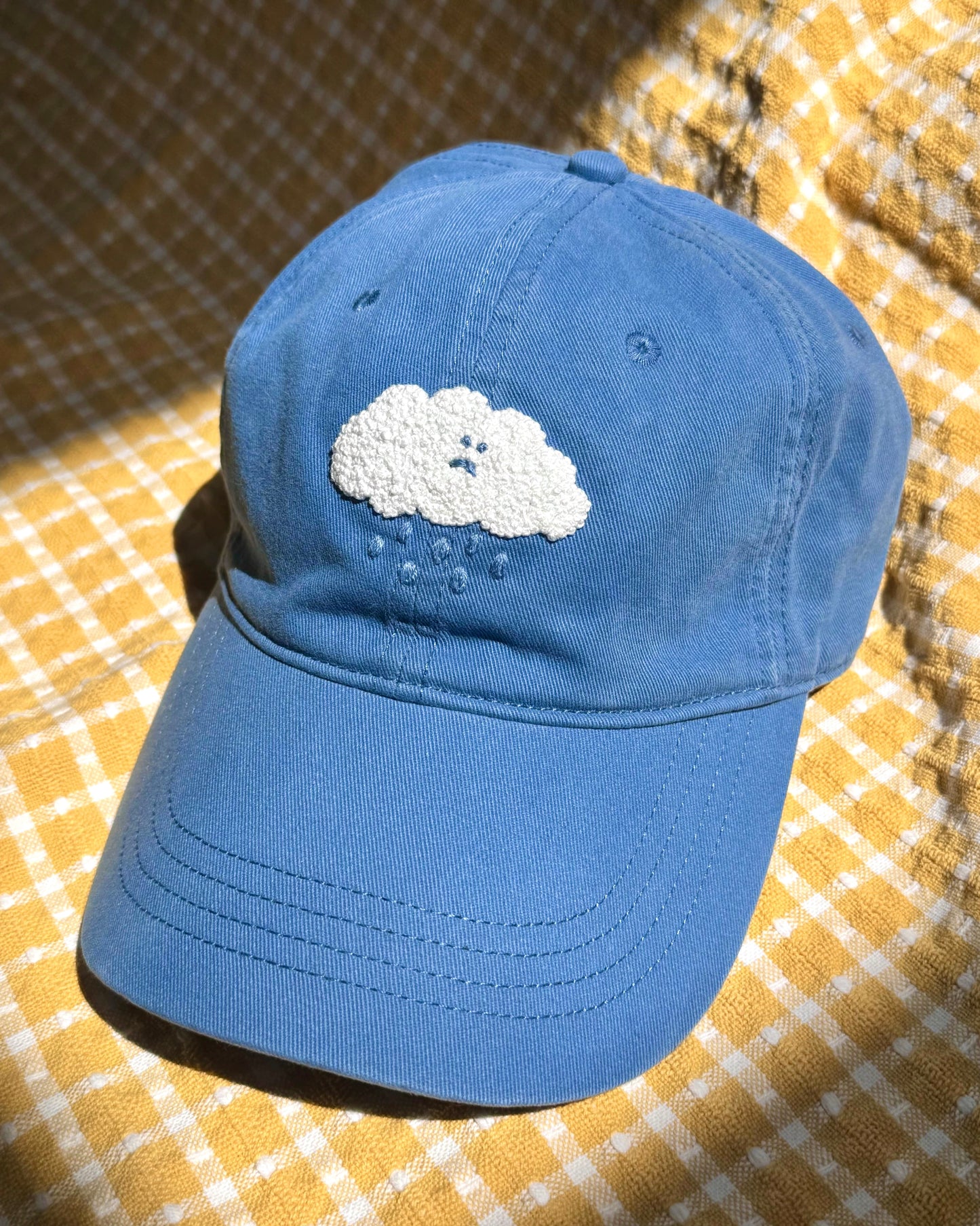 sad cloud baseball hat