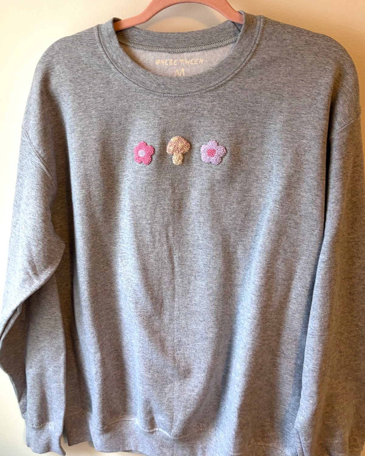 Pink and purple flower/mushroom crewneck