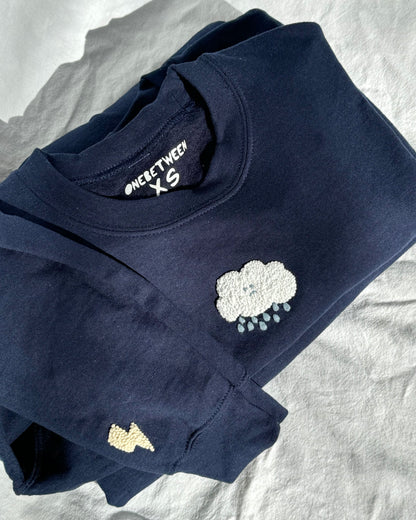 sad cloud crewneck
