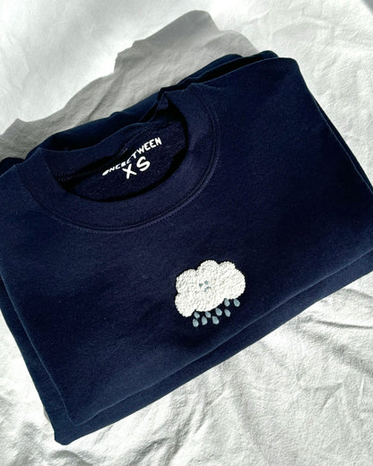 sad cloud crewneck