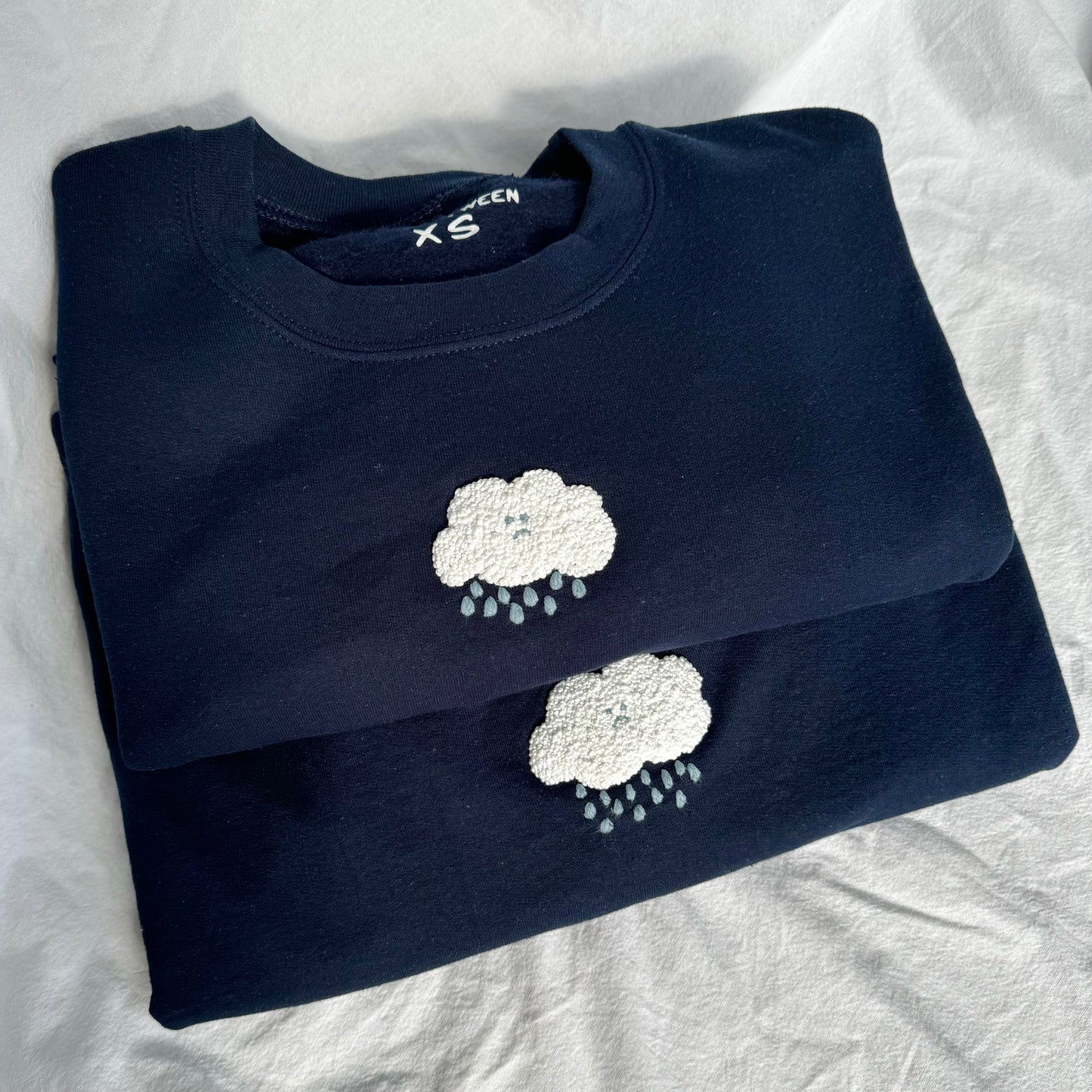 sad cloud crewneck