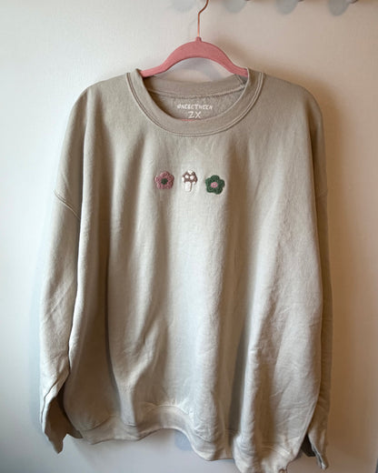 Green and pink mushroom crewneck