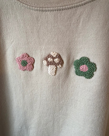Green and pink mushroom crewneck