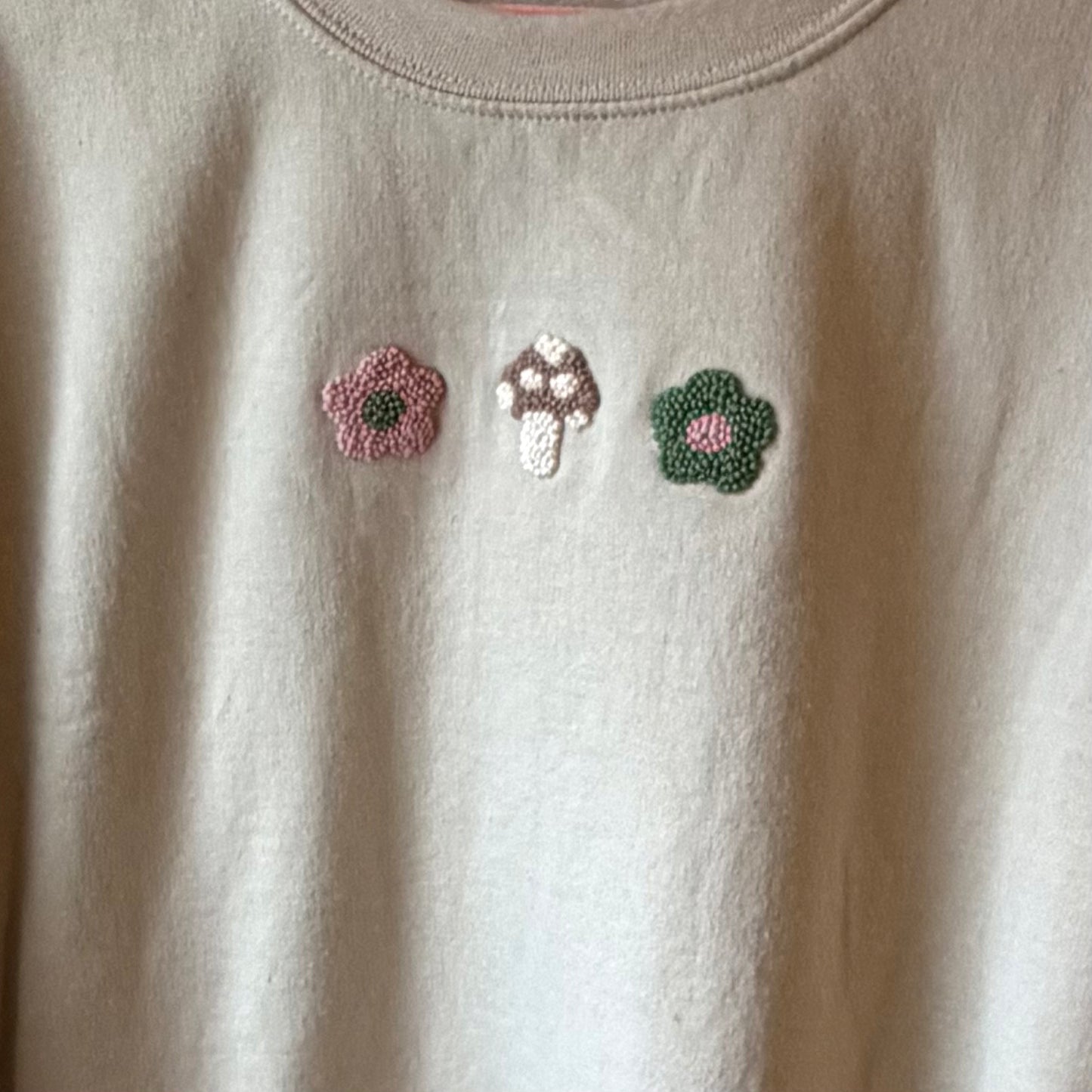 Green and pink mushroom crewneck
