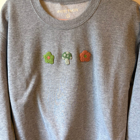 Green and orange mushroom crewneck